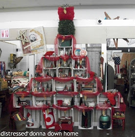 Creating a crate tree, Christmas tree, Christmas display antique mall booth, Riverfront Antique Mall
