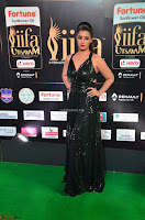 Varalaksmi in Green Glittering Sleeveless Backless Gown at IIFA Utsavam Awards 2017  Day 2  Exclusive 15.JPG