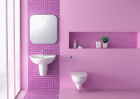 a toilet with pink walls