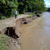 Río Amina destruye carretera