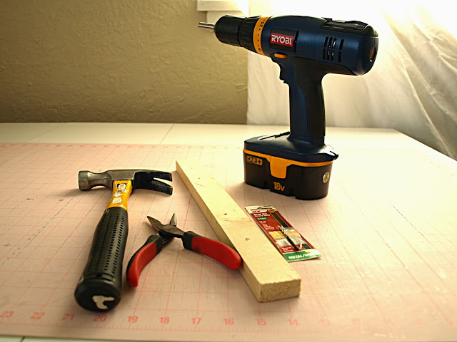 Tools needed to repair a leather sewing machine belt.