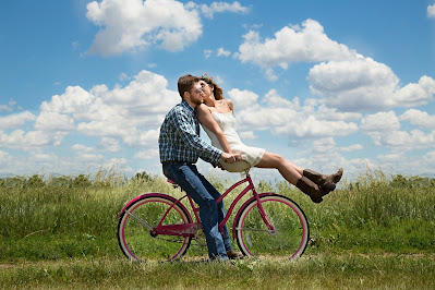two people on a bike