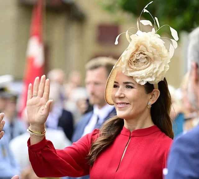 Crown Princess Mary wore a red Armonia silk georgette dress by Raquel Diniz. Crown Prince Frederik