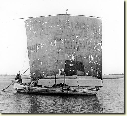 Indian boat with a square sail floating along the Ganges River - Bengal 1907