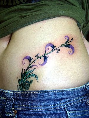 Home »Unlabelled » purple flower tattoos for girls lower back