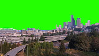 A free video of Seattle buildings, freeway and stadium set against a green screen background.