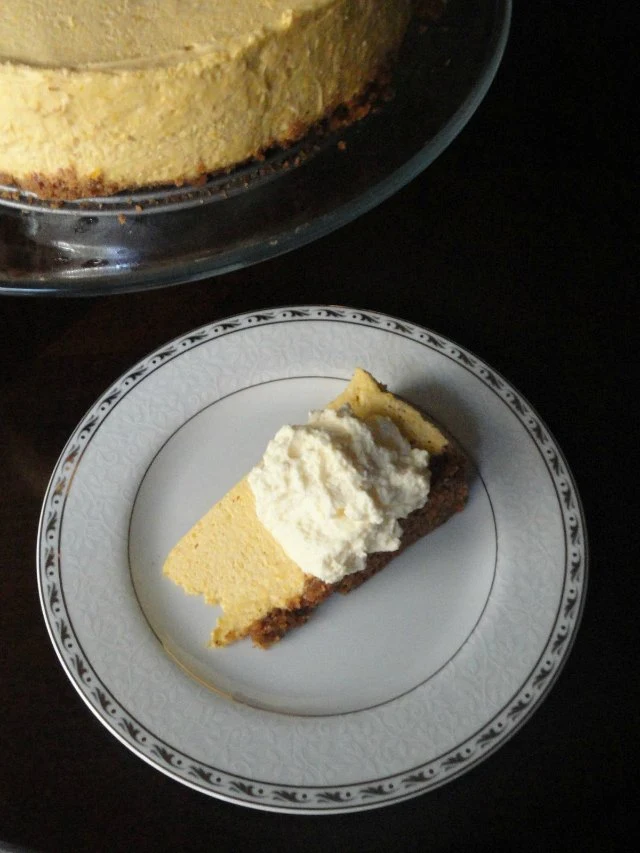 No Bake Pumpkin Cheesecake With Toasted Pecan Graham Cracker Crust recipe is a must have dessert for the Thanksgiving and Christmas dessert table from Serena Bakes Simply From Scratch.