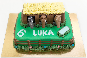 Horses in a barn fondant cake front