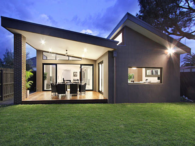 Picture of small contemporary home as seen from the backyard
