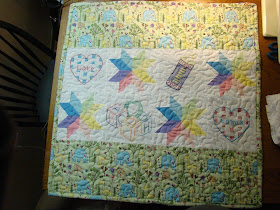 Starflower and embroidery blocks pastel baby quilt