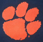 . that's because the logo was created with an actual tiger's paw print. (tiger paw tee)