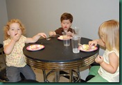 three amigos eating cake