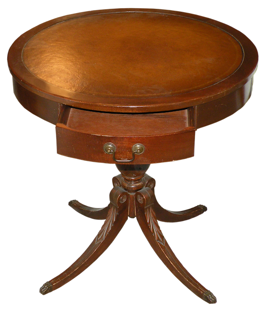 A round side table with  Duncan Phyfe legs, a small door and a pretty leather top.