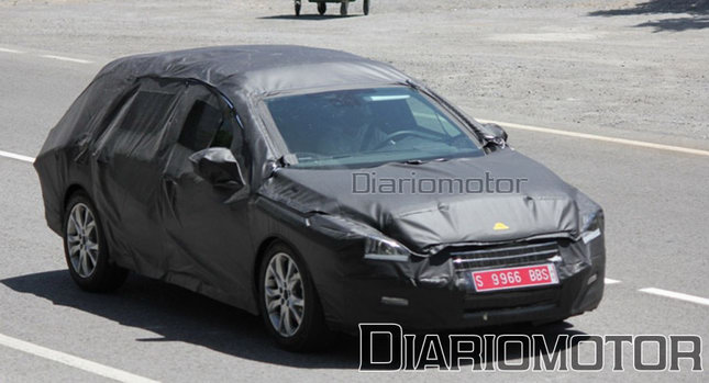  to be a heavily disguised prototype of the Peugeot 508 Station Wagon