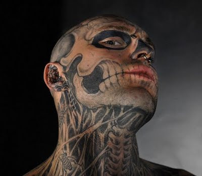 Spider tattooed on groom's face Skull Tattoos by Friday Jones