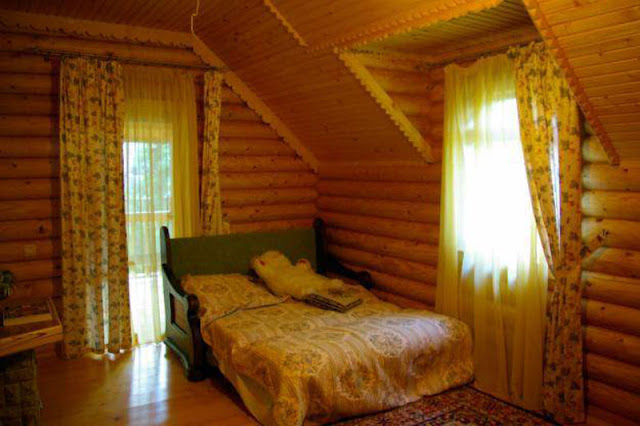 Bedroom in the wooden house