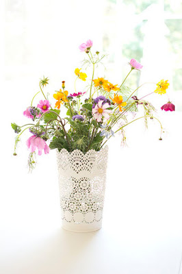 Tickled by the Creative Bug - Colorful wildflowers in a white vase against a bright white background