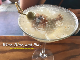 The black and bleu martini has a piece of tenderloin in it with bleu cheese stuffed olives