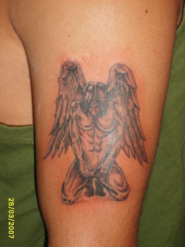 I want a fallen angel tattoo I think that tattoo shows my character
