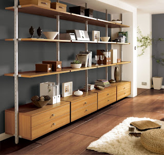 noticeable modular shelving unit for collectable displays mixed with fur rug and wooden floor