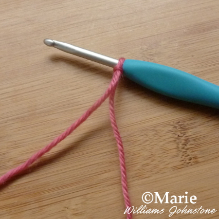 Cast on slip knot on crochet hook ready to start crocheting for beginners tutorial craftymarie