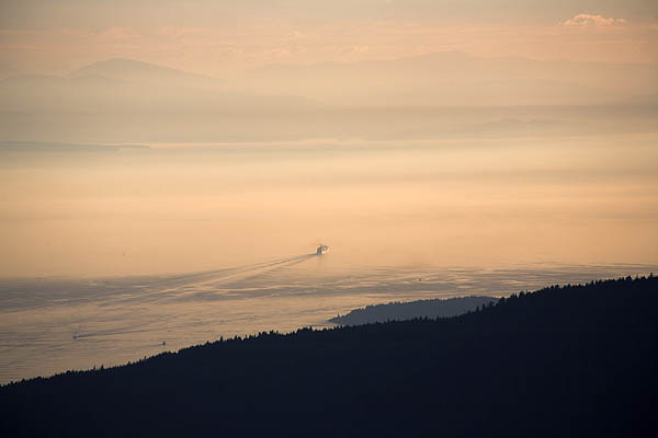 Cruise ship sets off from Vancouver at sunset heading up the Inside Passage to Alaska stock image