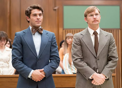 Netflix's film Extremely Wicked, Shockingly Evil and Vile 2019 movie still where Zac Efron, playing Ted Bundy, stands up in court to face his sentence