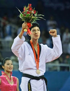 Rohullah Nikpai winning bronze