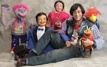 ndian puppeteer and ventriloquist Ramdas Pandhye with his handcrafted puppets; renowned for combining ventriloquism and traditional puppetry in modern performances.