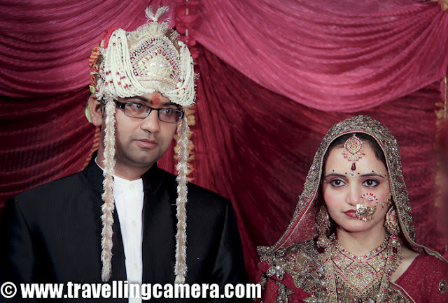 Here is a photograph of sweet Himachali  Couple. Typically Himachali Marriages happen in three days. On first day (Maaine), relatives and friends start coming at home. Some celebrations happen during the evening. Next day is more about formal gatherings, pooja and Barat. Second day Night is typical the time when actual marriage takes place. Third day is celebrated in different ways at various parts of Himachal. In Kangra it's called as 'Chhod' and 'Dham' is also commonly used in Hamirpur and Mandi...Most of the times marriages take place at home, but trend is slowly changing where main ceremony takes place in marriage halls which are better approachable to everyone...