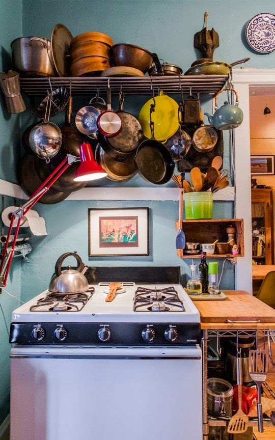 hanging pans a well loved well used kitchen small kitchen inspiration 