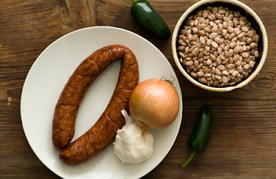 peppery pinto  beans and sausage