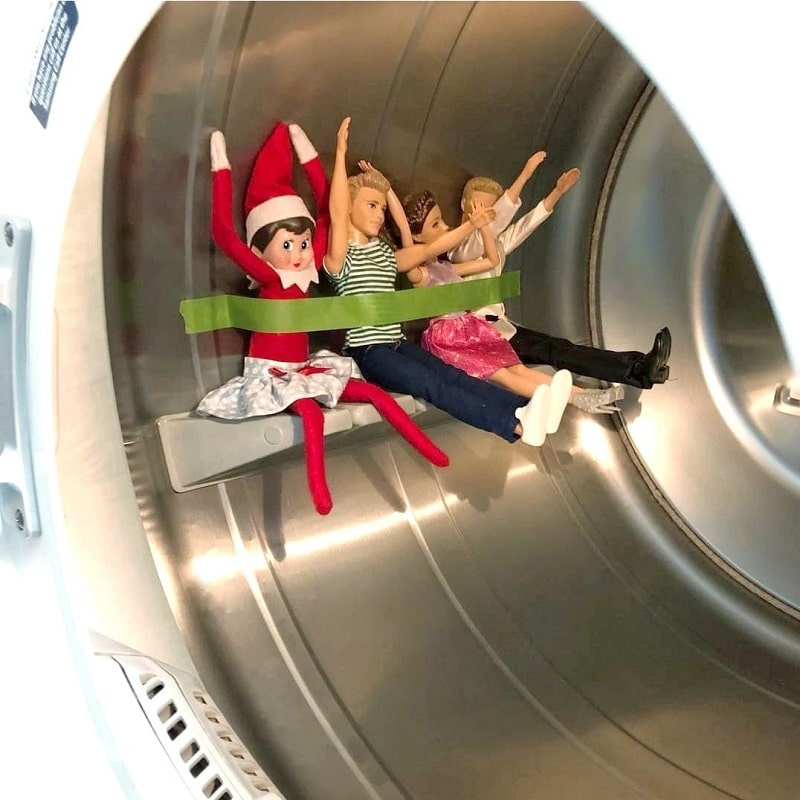 elf on the shelf and barbies in the washing machine