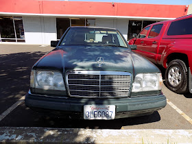 Faded Mercedes Benz before complete car paint job at Almost Everything Auto Body.