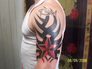 large arm tribal tattoo design