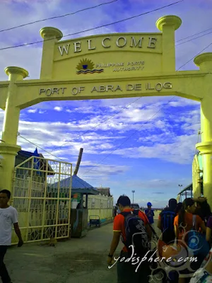 Welcome arch at the gate entrance of Abra de Ilog Pier