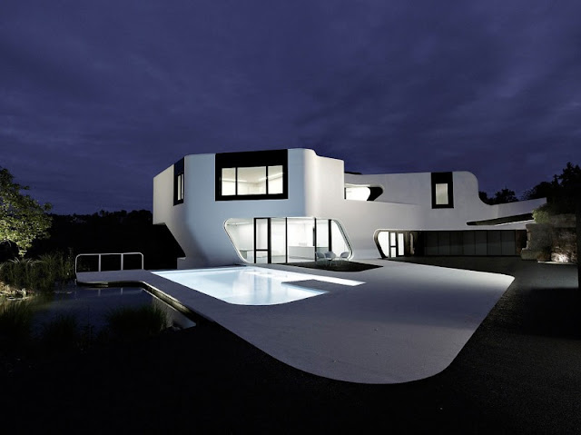 Pool which Has Soft Blue Colored Water and Silver Handrail Made from Stainless Steel