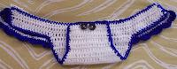 Sweet Nothings crochet free crochet pattern blog ; photo of one of the Nautical inspired sets in white and blue - the diaper showing the inside folded up