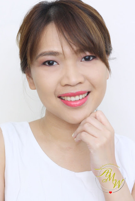 a photo of askmewhats wearing NYX Intense Butter Lipgloss in Napoleon Review