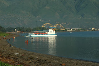 foto pantai talise dipagi hari