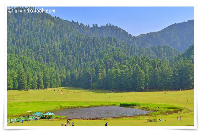 Beautiful Khajjiar Lake Backdrop of Hills covered with Deodar Trees