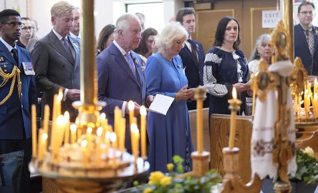 Prince Charles, Prime Minister Justin Trudeau, and Mary Simon, Governor General of Canada. the Duchess of Cornwall wore a blue dress