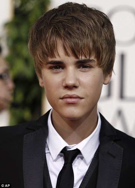 justin bieber new pictures in 2011. justin bieber new haircut