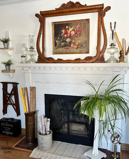 Photo of a living room decorated with family antiques and vintage collections.