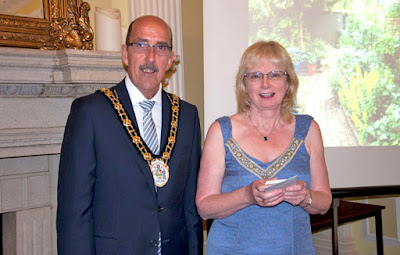 Councillor Jane Kitching, from Brigg, receiving her best garden award from the Mayor of North Lincolnshire, Councillor Trevor Foster. Picture courtesy of Christopher O'Rourke posted on Nigel Fisher's Brigg Blog, July 2016