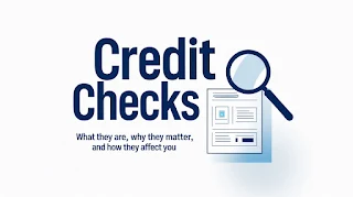 A person reviewing a credit report with a calculator and financial documents on the table