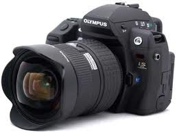 OLYMPUS DIGITAL CAMERA: PROFESSIONAL CAMERAS GO DIGITAL