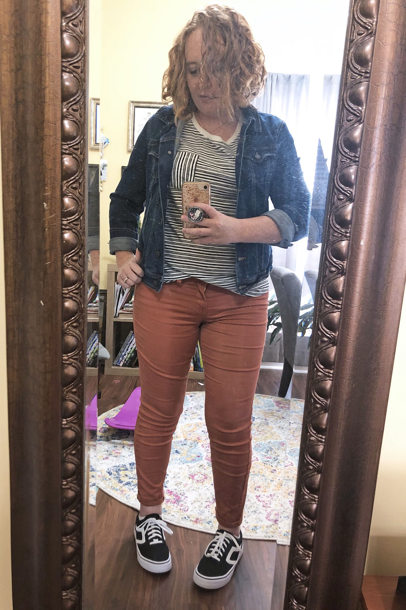 rust colored pants striped shirt