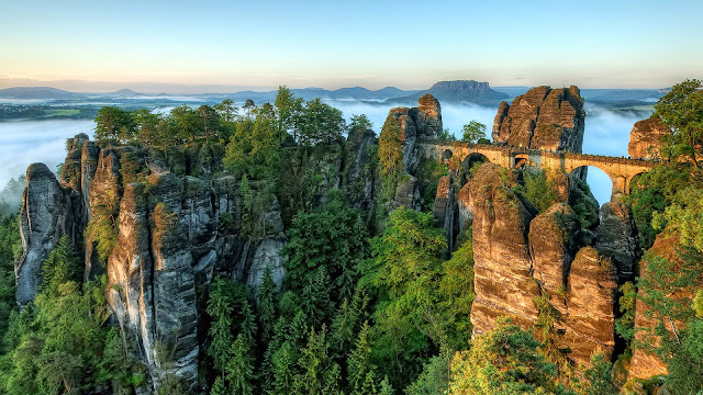 Landscape view of mountains nestled bridge