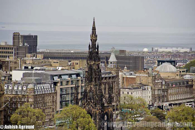 Edinburgh Castle is a fortress which dominates the skyline of the city of Edinburgh, Scotland !!! Human habitation of the site is dated back as far as the 9th century BC, although the nature of early settlement is not clear.  As one of the most important fortresses in the Kingdom of Scotland, Edinburgh Castle was involved in many historical conflicts, from the Wars of Scottish Independence ...Although Edinburgh Castle is formally owned by the Ministry of Defence of Scotland but most of the castle is now in the care of Historic Scotland and it is Scotland's most-visited paid tourist attraction.Edinburgh - Castle and train station !!The garrison left in the 1920s, but there is still a military presence at the castle... Military is largely ceremonial and administrative and including a number of regimental museums. It is the backdrop to the annual Edinburgh Military Tattoo and has become a recognizable symbol of Edinburgh and of Scotland.Another view of Edinburgh City from Royal Castle touching skylines..Inside Edinbugh Castle with some barracks on the left !!!!Inside Edinburgh CastleChapel inside Edinbugh Castle...People walking inside Inside Edinburgh CastleEdinburgh Castle - Mons MegMons Meg is a medieval super-gun now located at Edinburgh Castle, Scotland. There are varied views about it's origins, but it appears from the accounts of Philip the Good, Duke of Burgundy that it was made to his order around 1449 and sent as a gift 8 years later to King James II of Scotland, with other artillery supplies... This is picked from Wikipedia !Edinburgh Castle - Walking on the streets..View of Edinburgh city from Castle...St. Margaret's Chapel inside Edinburgh Castle - One on the oldest sections of this Castle !!!St. Margaret's Chapel in inside Edinburgh Castle of Scotland and it's the oldest surviving building in Edinburgh, Scotland. An example of Romanesque architecture, it is a Category A listed buildingLegend had it that St. Margaret worshiped in this small chapel, but recent research indicates that it was built at the beginning of the 12th century by her fourth son who became King David in 1124. The building has been restored and the interior presents much the same appearance as it did when first in use.Some colorful paintings form St. Margaret's Chapel inside Edinburgh Castle - One on the oldest sections of this CastleHalf Moon Battery and David's Tower...The Half Moon Battery, which remains a prominent feature on the east side of the castle, was built as part of the reconstruction works..Edinburgh Castle - Canons on the outer walls of this CastlView of Edinburgh City from Castle ...Oldest building in the castle, and in Edinburgh, is the small St. Margaret's Chapel ...Oldest building in the castle, and in Edinburgh- small St. Margaret's ChapelThe Royal Palace in Crown SquareThere are clear Directions about the places inside Edinburgh Castle - Royal Apartments, Great Hall etcThe Royal Palace comprises the former royal apartments which were the residence of the later Stewart monarchs. It was begun in the mid 15th century and it originally communicated with David's Tower.The Royal Palace in Crown Square - Inside Edinburgh Castle ... A closer look !!!Flag inside Edinburgh Castle ..There are lots of cannons on outer walls of Edinburgh Castle from where whole city is clearly visible ... Since it's situated on height, these areas give wonderful view of Edinburgh City !!The Scottish National War Memorial inside Edinburgh Castle - Scotland by Ashish ...The Scottish National War Memorial is located inside Edinburgh Castle and commemorates Scottish soldiers... It's for those serving with Scottish regiments, who died in the two world wars and in more recent conflicts. The monument was formally opened in 1927. It is housed in a redeveloped barrack block in Crown Square, at the heart of the castle, and incorporates numerous monuments.Inside Edinburgh Castle - People walking in Relaxed mode ...Canon areas inside Edinburgh Castle - Scotland Travel Photo Journey by Ashish ..A View of Edinburgh City from Castle of Edinburgh ..Beautiful Edinburgh City with nice view to the water-body in background...Architecture of Edinburgh City and Castle is really lovable... n would want to click photographs of such places again in future..Tourists looking at the map to ensure that they don't miss anything inside the castle. Also it helps to know which are main attractions which must be visited and which others can be compromised as per available time...Beautiful buildings around Royal Mile in Edinburgh city !!!The Royal Mile is a succession of streets which form the main thoroughfare of the Old Town of the city of Edinburgh in Scotland.Part of the Royal mile inside Edinburgh city of Scotland ...The Royal Mile is approximately one Scots mile long and runs between two foci of history in Scotland, from Edinburgh Castle at the top of the Castle Rock down to Holyrood Abbey. The streets which make up the Royal Mile are (west to east) Castle Esplanade, Castlehill, Lawnmarket, High Street, Canongate and Abbey Strand. The Royal Mile is Edinburgh Old Town's busiest tourist street...Edinburgh Castle is huge as you might have got an idea from all these photographs.. See the size of people roaming around and building around... This photograph must be helpful in setting right perspective about buildings inside Castle !!!Camera Obscura at Edinburgh City of Scotland ...The camera obscura is an optical device that projects an image of its surroundings on a screen. It is used in drawing and for entertainment, and was one of the inventions that led to photography. The device consists of a box or room with a hole in one side. Light from an external scene passes through the hole and strikes a surface inside where it is reproduced, upside-down, but with color and perspective preserved. The image can be projected onto paper, and can then be traced to produce a highly accurate representation.